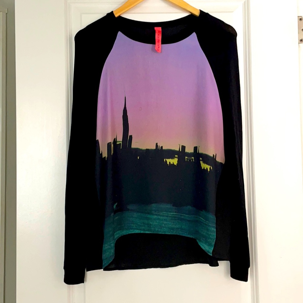 2/$25 eight sixty cool screen silk blouse with soft jersey arms.  Size small.